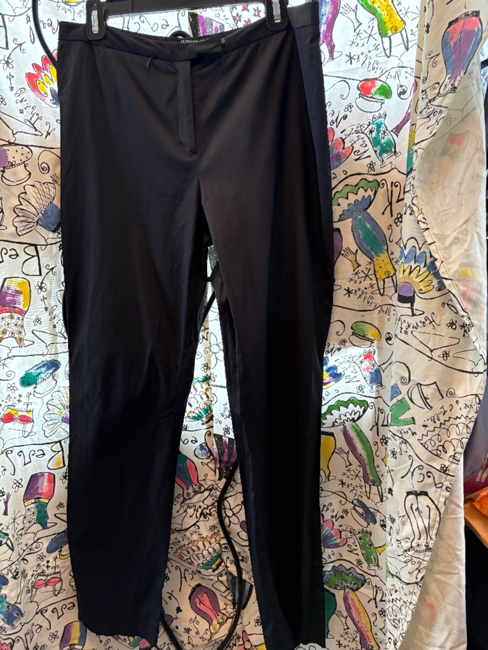 Kenneth Cole low rise, flat front straight leg pants.